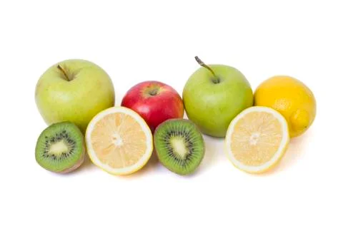 Fruits in a composition on a white background. Lemon with apples and kiwi on Stock Photos