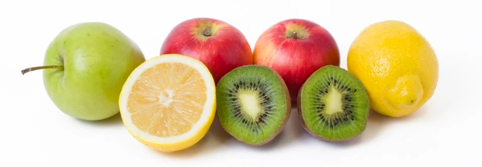 Fruits in a composition on a white background. Lemon with apples and kiwi on Stock Photos