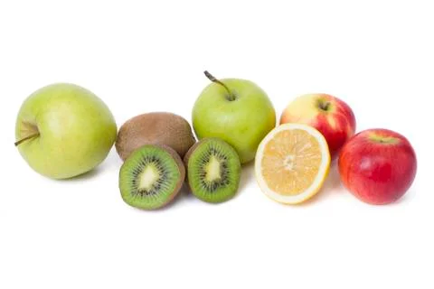 Fruits in a composition on a white background. Lemon with apples and kiwi on Stock Photos