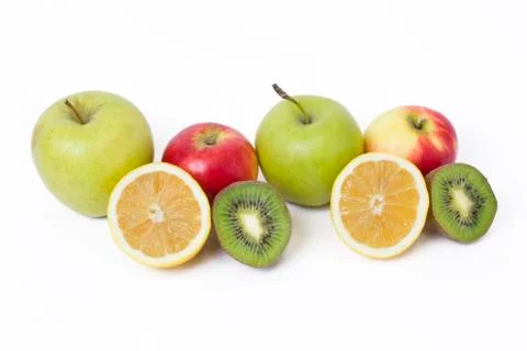 Fruits in a composition on a white background. Lemon with apples and kiwi on Stock Photos