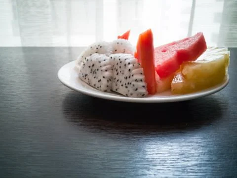 Fruits in a dish Stock Photos