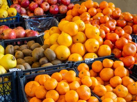 Fruits at the eastern market. Fruits in boxes for sale. The atmosphere of a.. Stock Photos