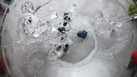 Fruits fall into water and splash Stock Footage 265662432