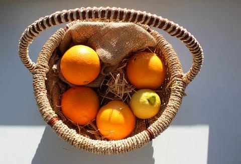 Fruits illuminated by the sun on windowsill flat lay photo Stock Photos