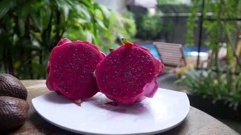 Fruits lie on a table in the background pool dragon fruit, mangosteen 库存影片 126970023