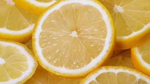 Fruits pattern, close shot. Yellow lemon slices structure. Closeup of a del.. Stock Footage 265841600