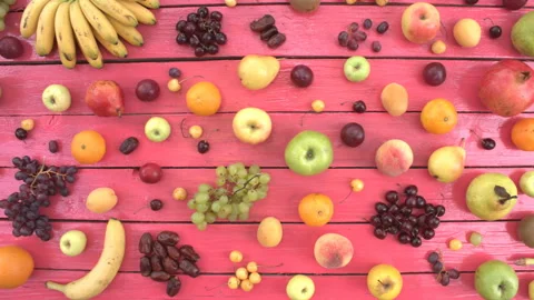 Fruits on pink ecological background. Top view. Stock Footage 98859080