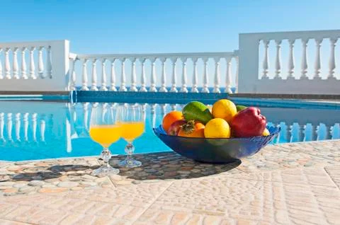 Fruits at poolside Stock Photos