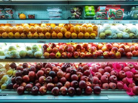 Fruits on racks Stock Photos