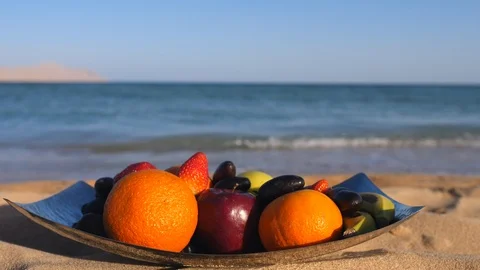 Fruits On Sandy Beach Stock Footage 106870126