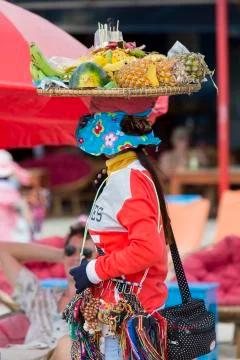 Fruits seller working on the beach of Koh Rong in Cambodia Stock Photos