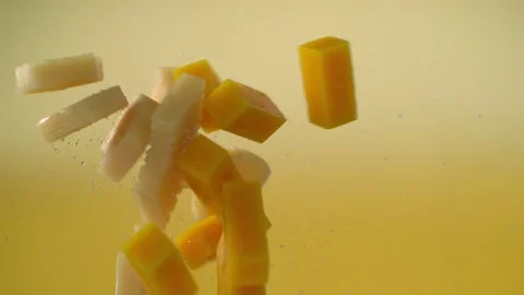   Fruits slices mango and pineapple meet and mix Stock Footage 81798765