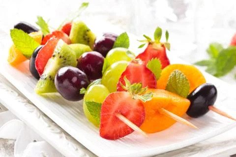 Fruits on sticks. Stock Photos