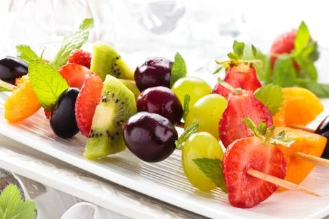 Fruits on sticks. Stock Photos