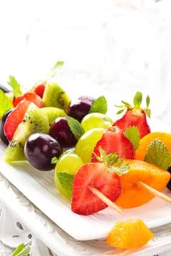 Fruits on sticks. Stock Photos