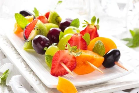 Fruits on sticks. Stock Photos