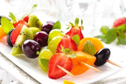 Fruits on sticks. Stock Photos