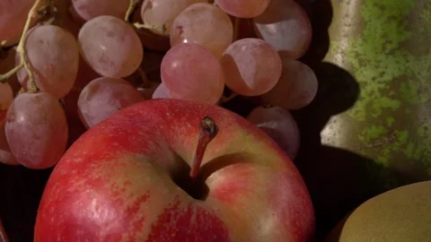 Fruits on the table. apple pear plum grapes 스톡 동영상 273051396