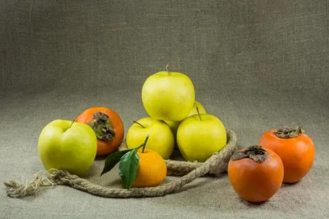 Fruits on a table covered with burlap Stock Photos
