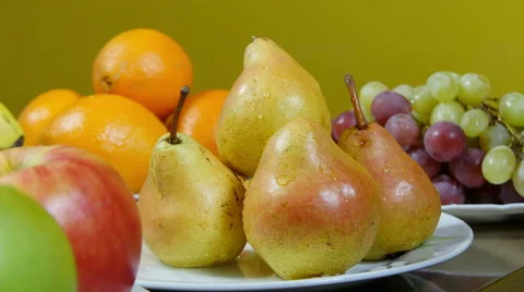 Fruits on table, dolly shot. From apples,over pears,to grapes,close up Stock-Footage 60383430