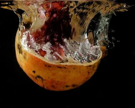 Fruits in water Stock Photos