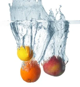 Fruits in water Stock Photos