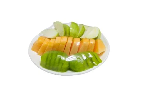 Fruits which are wrapped with plastic film preservation on a table. Photos