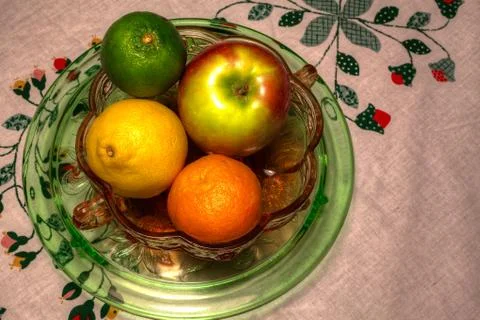 Fruits on a white tablecloth Stock Photos