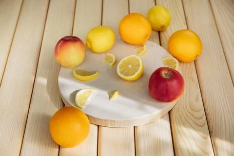Fruits on a wooden board Stock Photos