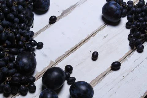 Fruits on a wooden table Stock Photos
