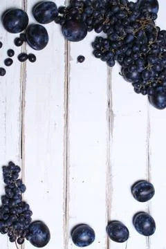 Fruits on a wooden table Stock Photos