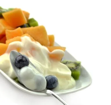 Fruits with yogurt Stock Photos