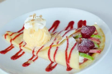 Fruity crape and  ice cream Stock Photos
