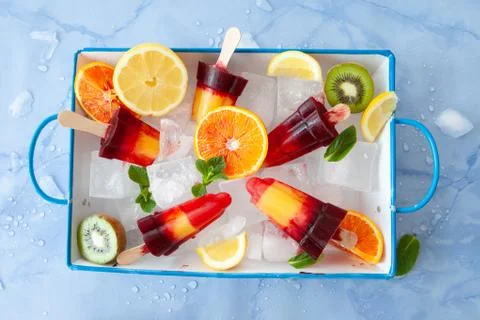 Fruity ice popsicles Stock Photos