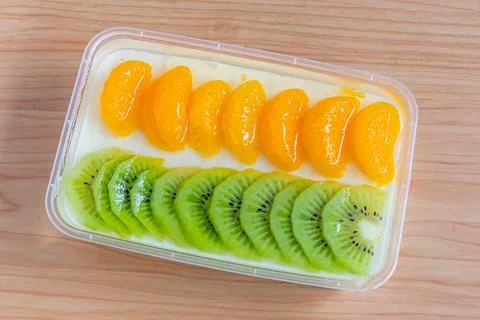 Fruity milk pudding, sweet vanilla silk pudding dessert with fruit topping Stock Photos