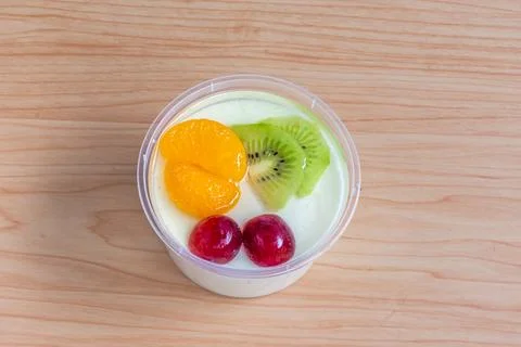 Fruity milk pudding, sweet vanilla silk pudding dessert with fruit topping Stock Photos