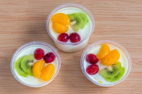 Fruity milk pudding, sweet vanilla silk pudding dessert with fruit topping Stock Photos