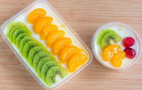 Fruity milk pudding, sweet vanilla silk pudding dessert with fruit topping Stock Photos