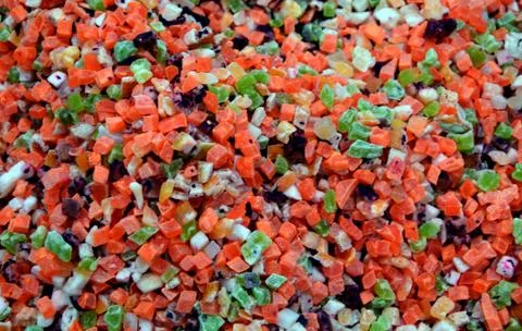 Fruity mix  for cold tea - mango, papaya, kiwi, pineapple. texture of pieces Stock Photos