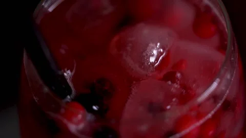 Fruity red cocktail steering HD Stock Footage 175742117