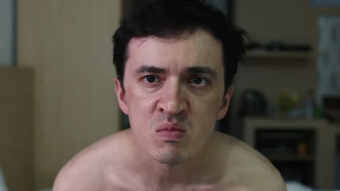 Frustrated angry man looking at the camera with intense emotion Stock Footage 344279538