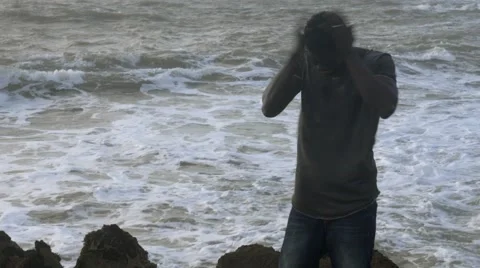 A frustrated black guy at the beach 03 Видео 67556664