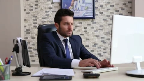 Frustrated Businessman Crumpling Document While Working at Office Stockbeeldmateriaal 346183084