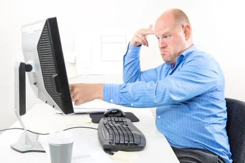 Frustrated businessman with problems at work Stock Photos