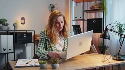 Frustrated businesswoman having software problems with laptop error or mistake Stock Footage 265680786