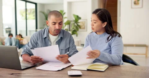 Frustrated, couple and laptop with documents for financial crisis, mistake or Stock Footage 335311317