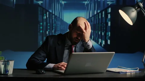 Frustrated database admin making mistake in data center Stock Footage 233221730