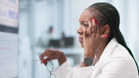 Frustrated Doctor Using Computer To Manage Boring Medical Spreadsheet. Stock Footage 337645578