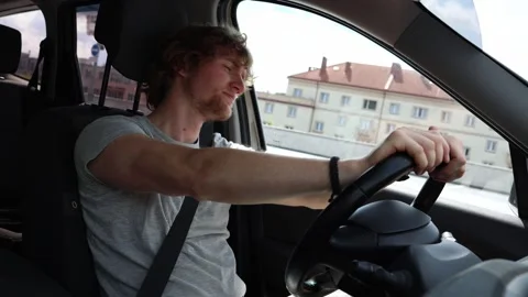 Frustrated driver feels overwhelmed after having a bad day on the road Stock-Footage 343719933
