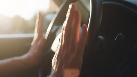 Frustrated Driver Hands Slapping Car Steering Wheel | Man Expressing Anger Stock Footage 339751632